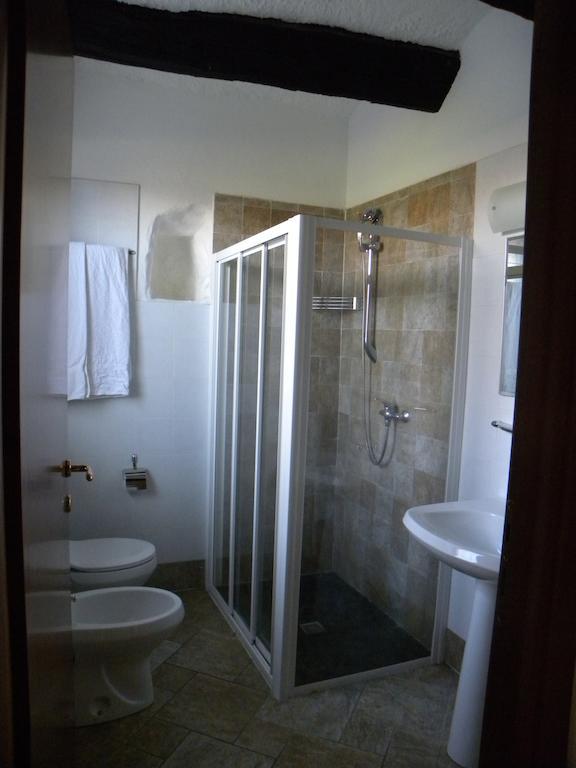 Agriturismo Fano'S Farm Suno Room photo