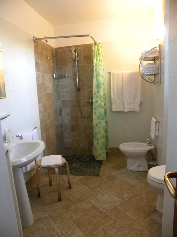 Agriturismo Fano'S Farm Suno Room photo